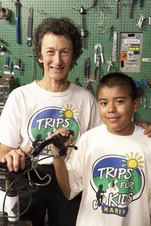 Marilyn Price with a student at the Trips for Kids Re-Cyclery