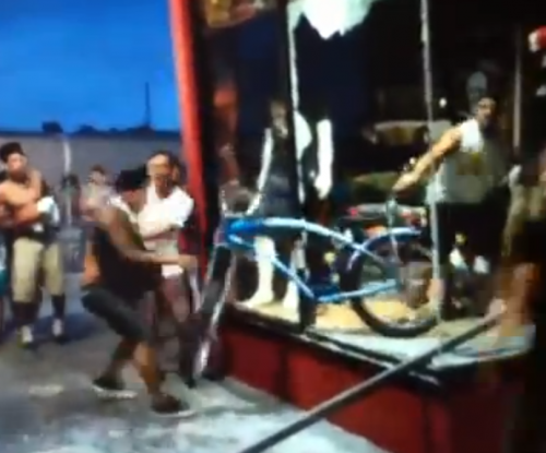 In a bystander's video, an Easyrider employee fights to keep a bike.