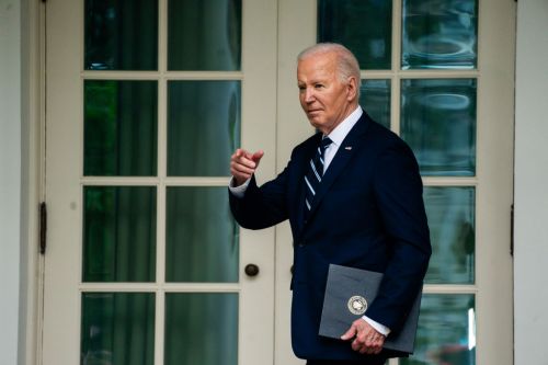 Biden on Tuesday after signing a document related to the China tariffs. (Photo by Demetrius Freeman/The Washington Post via Getty Images)