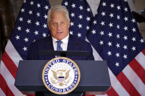 LeMond speaks at the medal ceremony on July 9. Photo by Alex Wong/Getty Image