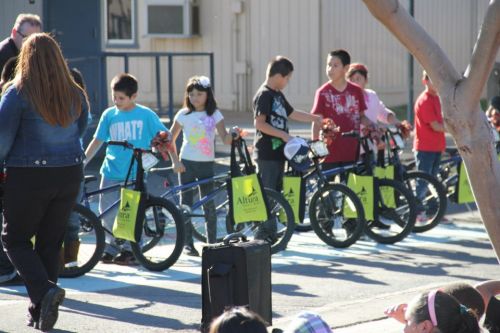 Happy kids with new bikes. Photo courtesy Jenson USA