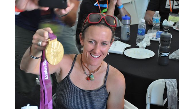 Olympic gold medalist Kristin Armstrong shows off her medal after the SRAM-Zipp-Quarq Tuesday Morning Ride. Photo: Jill Janov