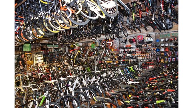 No Boundaries Sport has some of the most innovative merchandising and display fixtures we've seen, and they are nearly all made of recycled and repurposed materials, from old chainrings to hurricane shutters and road signs. The shop also packs an enormous amount of inventory into a tight space. 