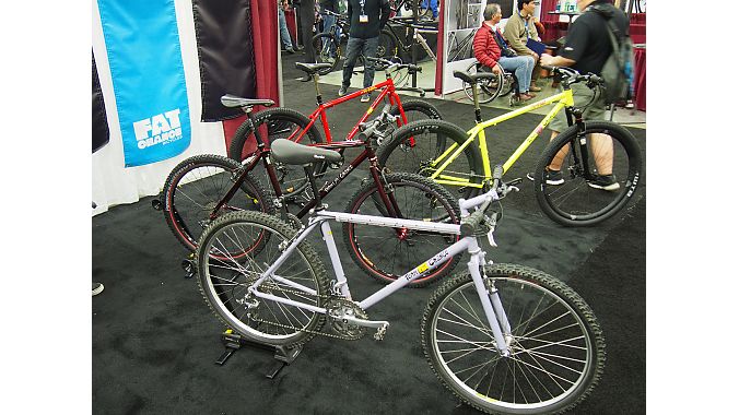 Fat Chance bikes look surprisingly similar, with a purple '90s vintage Yo Eddy in front of a yellow Yo Eddy 29er and red Yo Eddy 27.5 current production hardtails.