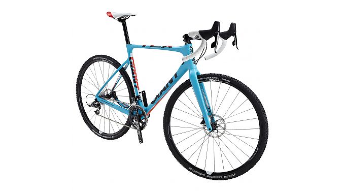 Giant's 2014 model year line includes the TCX Advanced, a carbon, disc brake cyclocross race bike with a sub-1050-gram frame. The bike features a 15 millimeter front thru-axle for steering and braking precision, asymetrical chainstays, internal cable routing, a D-shaped seatpost and roomy tire clearance: 50 millimeters front and 44 millimeters at the rear. Models includes the TCX Advanced O, with SRAM Red 22 drivetrain and Red hydraulic brakes, and the TCX Advanced 1 with SRAM Force drivetrain with SRAM S-S