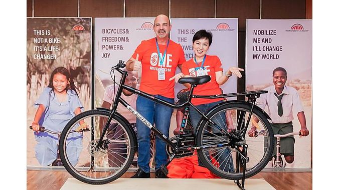 Photo 1: WBR CEO Dave Neiswander (left) and Giant Group CEO Phoebe Liu (right) celebrate the milestone of the one millionth Buffalo Bicycle produced through the long-standing collaboration between Giant Group and World Bicycle Relief at Giant Group’s Tianjin manufacturing facility. Photo 1: WBR CEO Dave Neiswander (left) and Giant Group CEO Phoebe Liu (right) celebrate the milestone of the one millionth Buffalo Bicycle produced through the long-standing collaboration between Giant Group and World Bicycle Relief at Giant Group’s Tianjin manufacturing facility.