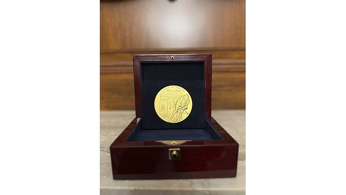 The medal. Photo by Shane Cooper. 
