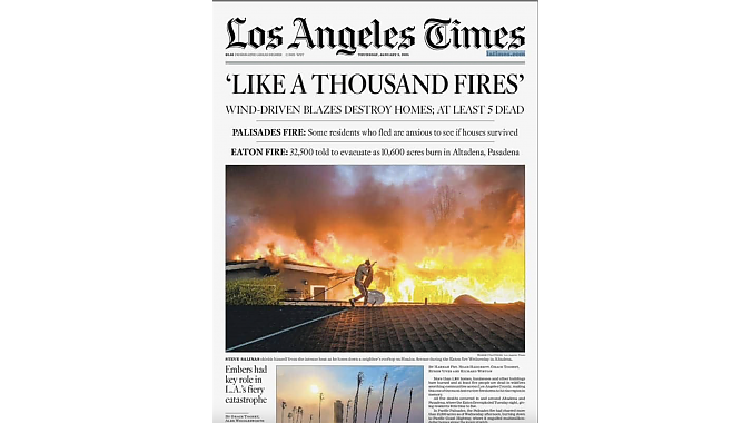 Salinas made the cover of the LA Times while on a neighbor's roof Wednesday morning.