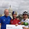 Johnson presented Bikes Belong with a $100,000 check after the 2012 Ride on Washington.