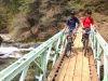 Jet Lites owners Mike Henderson, left, and Jim Scripps take a bridge break near Downieville, California. Jet Lites owners Mike Henderson, left, and Jim Scripps take a bridge break near Downieville, California