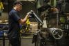 A worker builds a Saris trainer at its Wisconsin factory. Saris photo.